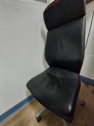 Photo détaillant le don Chaise de bureau noire