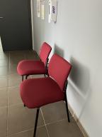 Photo détaillant le don Chaise rouge