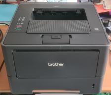 Photo détaillant le don Imprimante Laser BROTHER