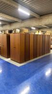 Photo détaillant le don Lot d'armoires hautes en bois