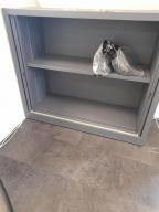 Photo détaillant le don armoire basse