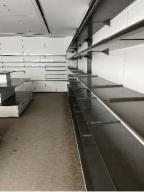 Photo détaillant le don Etagères marrons (boutique de musée) - MDF stratifié / Corian / Béton ciré