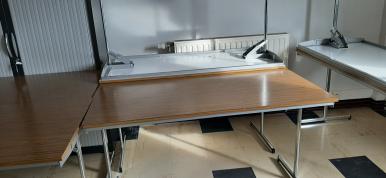 Photo détaillant le don tables de réunion pliantes