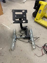 Photo détaillant le don Porte écran mural articulé